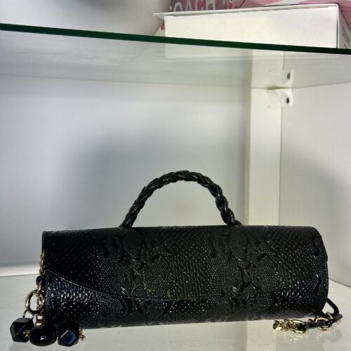 Black cylindrical handmade leather bag – The Braids Brand Ghana