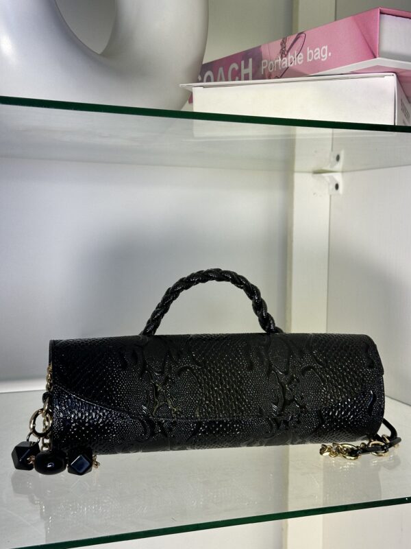 Black cylindrical handmade leather bag – The Braids Brand Ghana