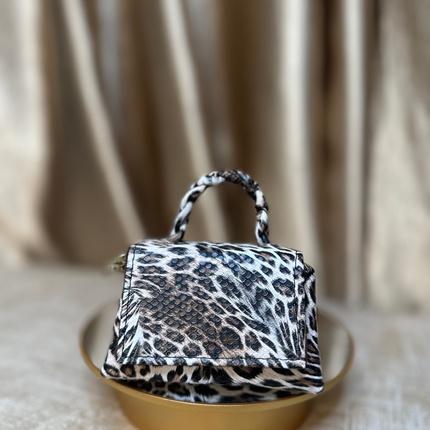 Mini handmade leather handbag in prints – The Braids Brand Ghana