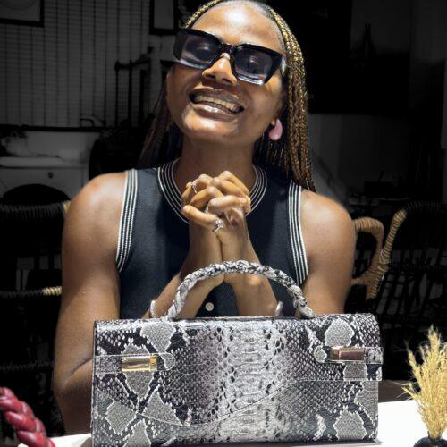 Handmade black and white snake skin leather curved flap bag