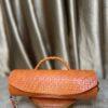 Orange Cylinder leather bag- The braids Brand