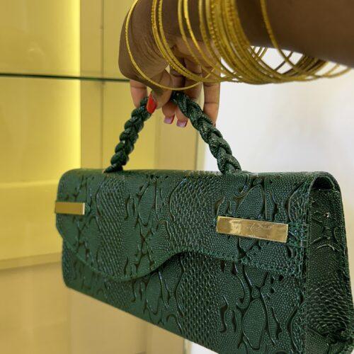 Curved flap leather bag in Green - The braids Brand