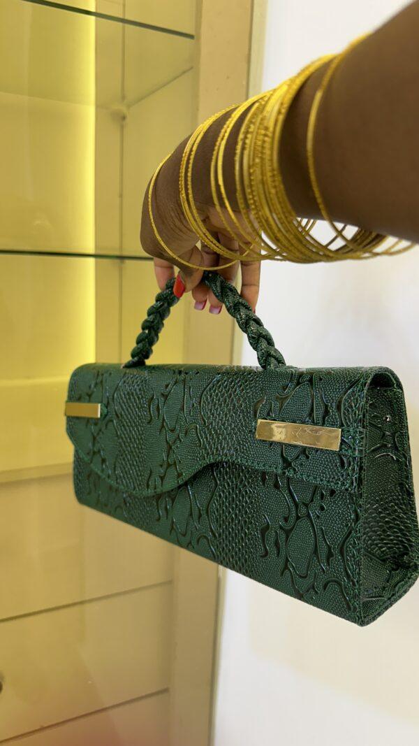 Curved flap leather bag in Green - The braids Brand
