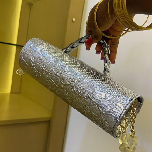 Cylinder leather bag in silver - The braids Brand