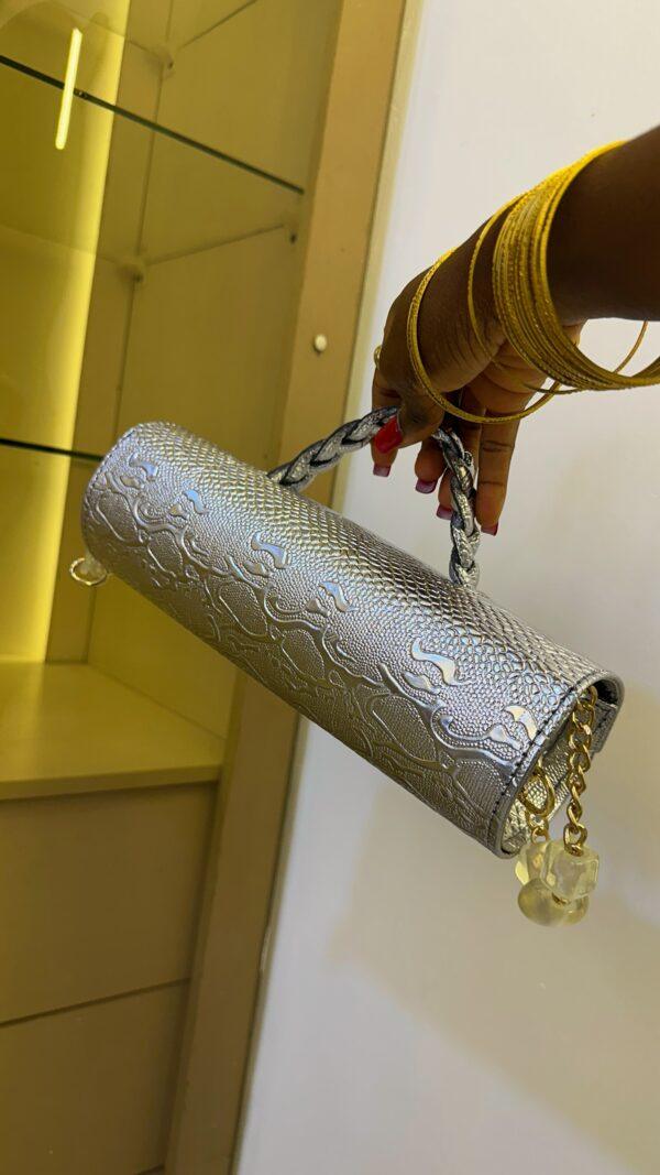 Cylinder leather bag in silver - The braids Brand