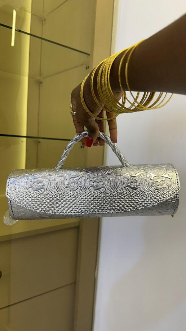 Cylinder leather bag in silver - The braids Brand